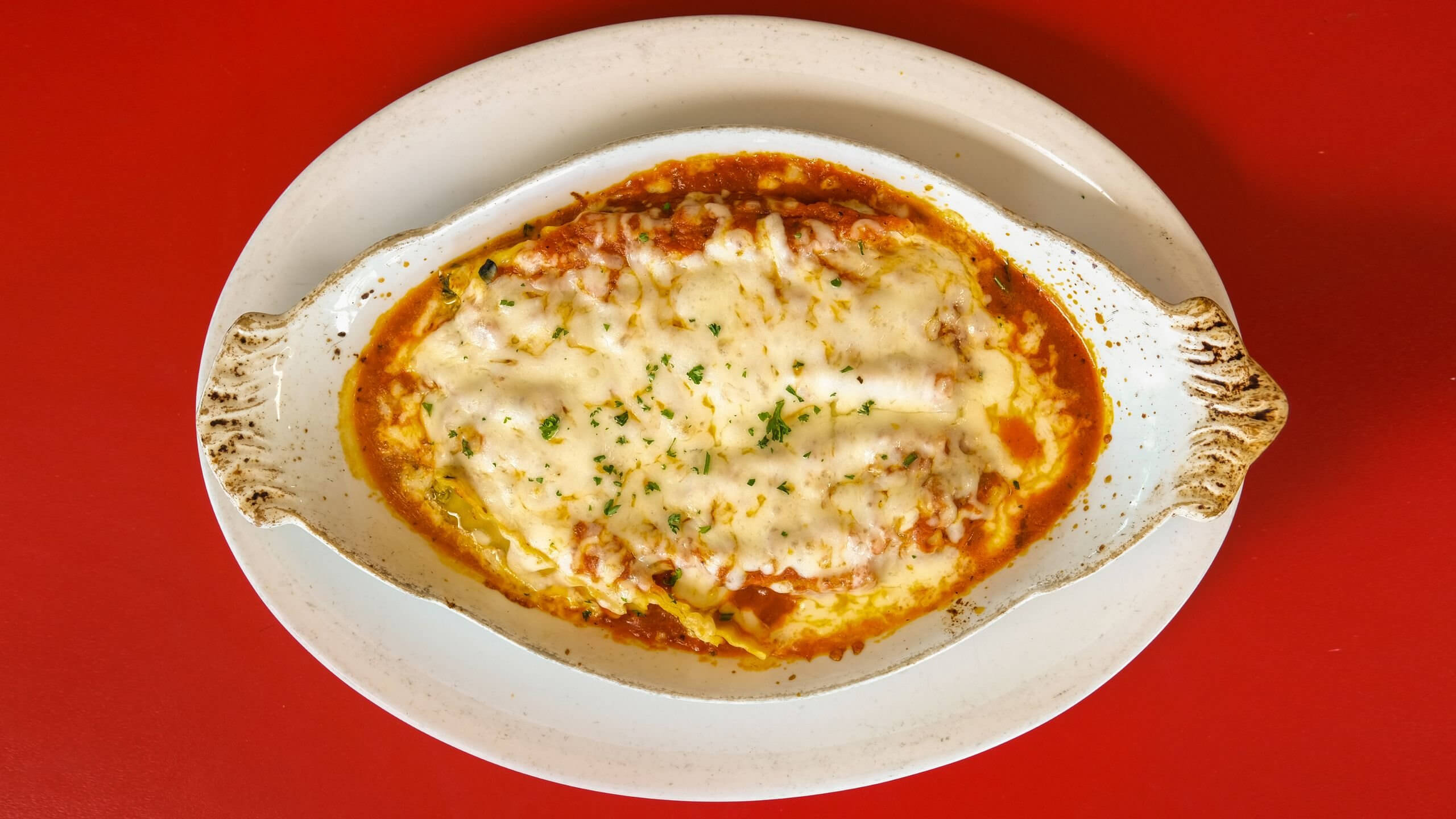 Meat Lasagna with Bolognese and Italian cheeses at Joe&rsquo;s Pizza Italian Cuisine & Bar