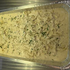Fettuccine Alfredo prepared for Italian catering at Joe&rsquo;s Pizza Italian Cuisine & Bar