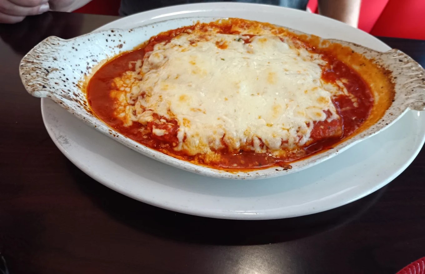 Three Cheeses Manicotti baked in marinara sauce at Joe&rsquo;s Pizza Italian Cuisine & Bar