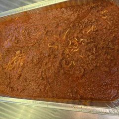Spaghetti with meat sauce prepared for catering at Joe&rsquo;s Pizza Italian Cuisine & Bar